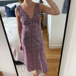 Black and pink floral patterned midi dress from verge girl